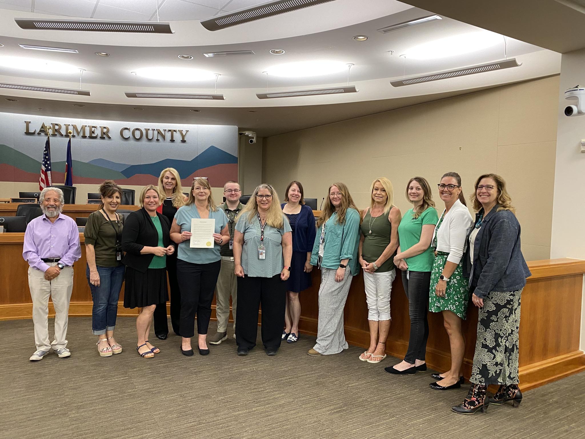 BCS staff who work in Child Support Services celebrated the Board of County Commissioner's Proclamation of August as Child Support Awareness Month in Larimer County.