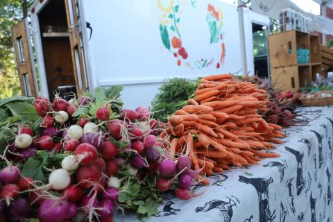 Produce sits on a table at the Larimer County Farmers' Market