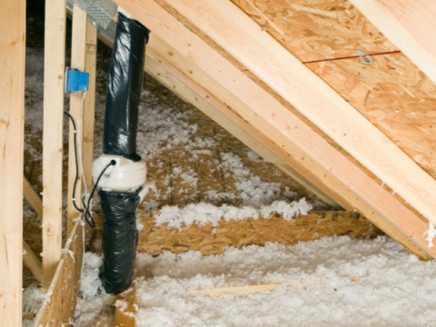 An attic of a home with a radon mitigation system installed