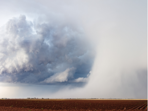 Storm Over Farm Land