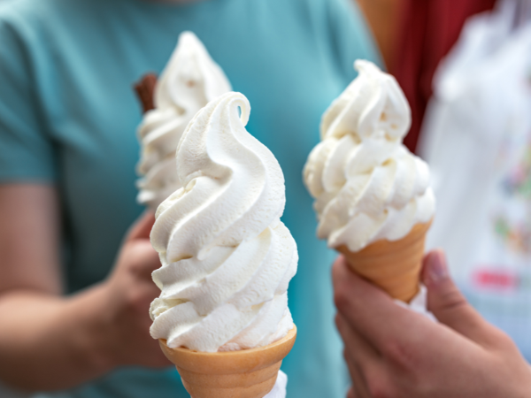 Three soft serve ice cream cones